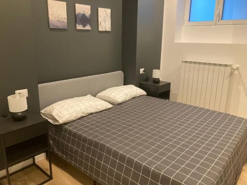 A bed or beds in a room at Fiera City Life 1 Top Apartment
