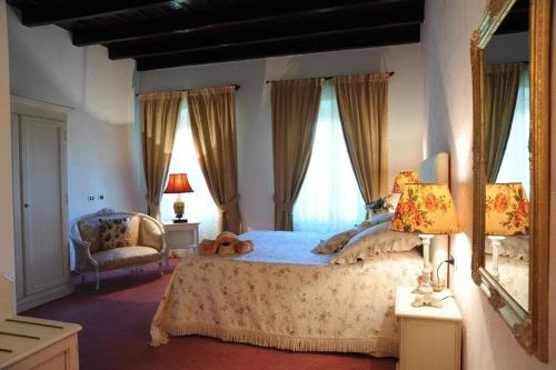 Voodi või voodid majutusasutuse Villa Baroni toas