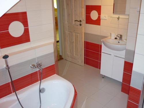 a bathroom with a toilet and a sink at Apartmány u tenisového kurtu in Mosty u Jablunkova