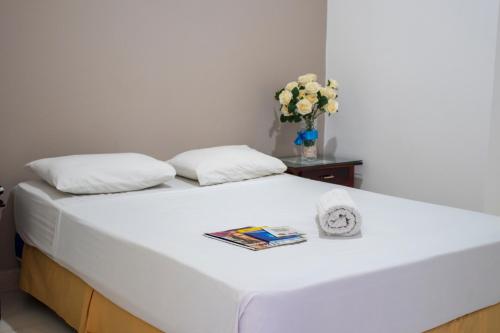 Cama o camas de una habitación en Hotel Isabella