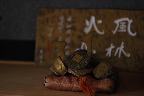 a figurine of a person sitting on top of a table at [貸切り] 220㎡ 月のワルツ 108年前の高級古民家 in Komoro