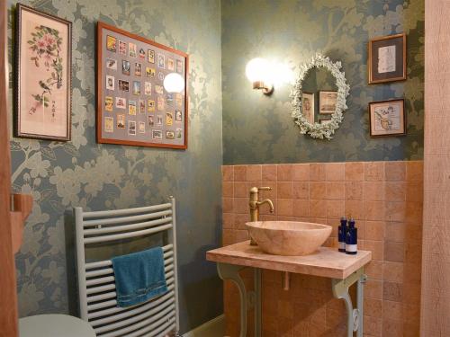 a bathroom with a sink and a toilet at Mill Of Burncrook in Glenlivet