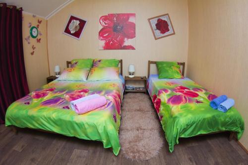 Cama o camas de una habitación en Roshchinskaya Guest house