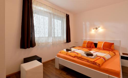 En eller flere senge i et værelse på Apart bianca Zillertal