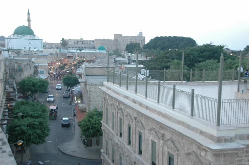 a view of a busy city street with cars at Akkotel-Boutique hotel in ‘Akko