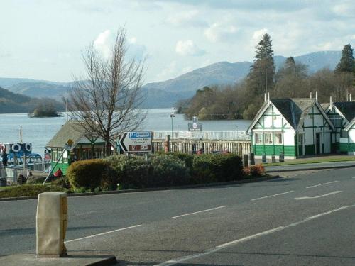 a street with houses on the side of the road at Holly Cottages in Bowness-on-Windermere