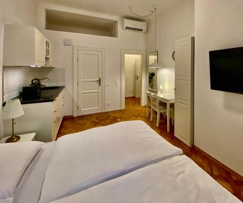 Katil atau katil-katil dalam bilik di Ars Longa apartments