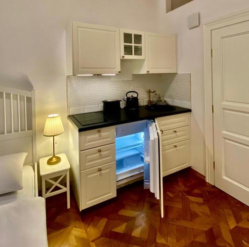 Dapur atau dapur kecil di Ars Longa apartments
