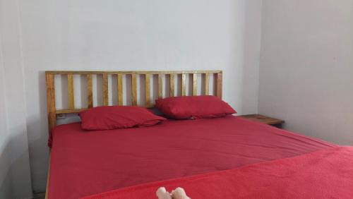 Postel nebo postele na pokoji v ubytování Harry & Mimin Homestay
