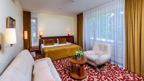 Postel nebo postele na pokoji v ubytování Hotel Violeta