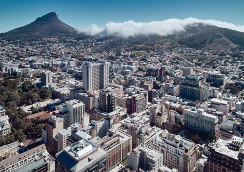 an aerial view of a city with a mountain at Gorgeous George by Design Hotels ™ in Cape Town