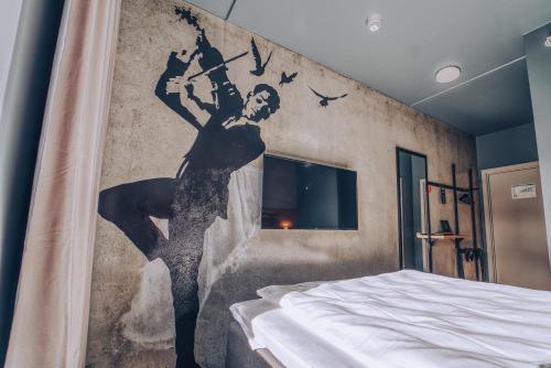Postel nebo postele na pokoji v ubytování Smarthotel Bodø