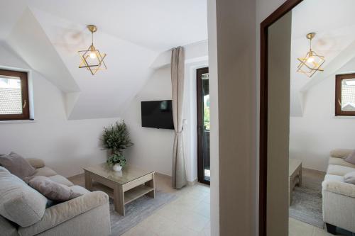 Televisyen dan/atau pusat hiburan di House Klasika - Adults Only