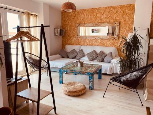 a living room with a couch and a table at BEACH HOUSE ! in Tarifa