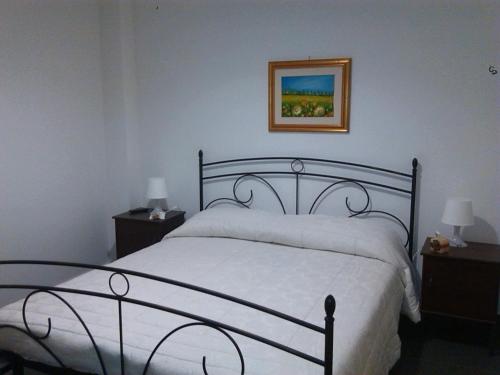Postel nebo postele na pokoji v ubytování B&B Largo Barile