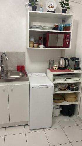 Kuchyň nebo kuchyňský kout v ubytování Studio - Carré de Soie Vaulx en Velin