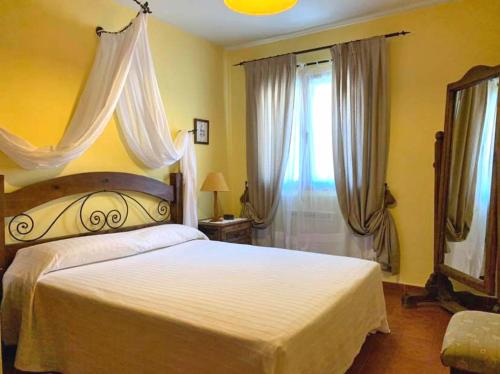 Кровать или кровати в номере Casas rurales Valle de El Paular