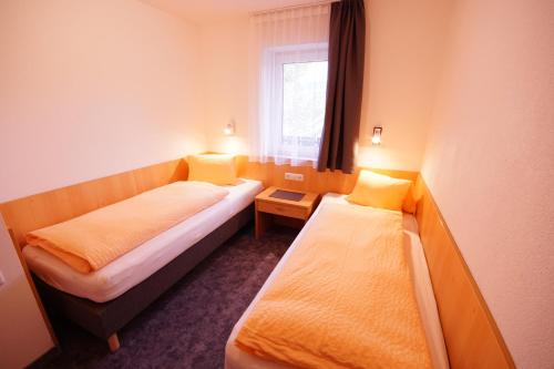 Cama o camas de una habitación en Ferienhaus Mott
