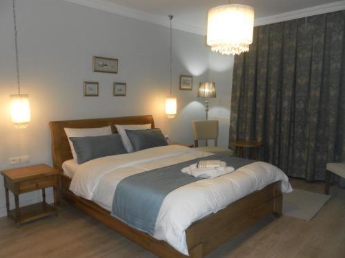 Postel nebo postele na pokoji v ubytování D&C Göcek Hotel