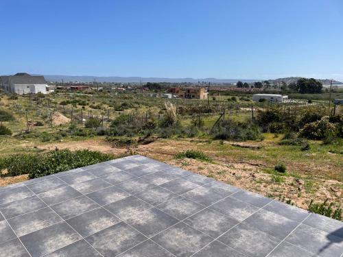 an overhead view of a tile floor in a field at Casa de campo, con hermosa vista al mar in Tongoy