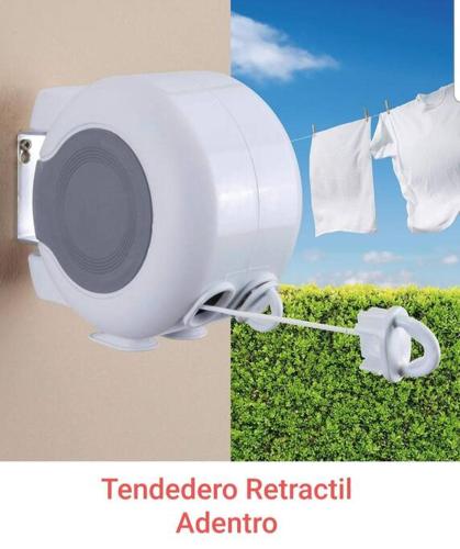 a white camera attached to a wall with a clothesline at Departamento D centrico 2 camas Tv Ac wifi cocina parking in Ciudad Valles