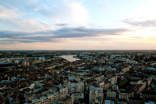 an aerial view of a city with a river at Cerise Nantes La Beaujoire in Nantes