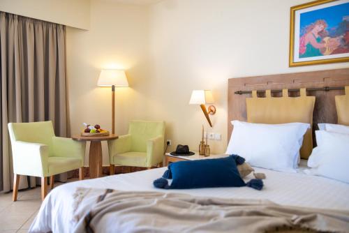 En eller flere senge i et værelse på Giannoulis - Santa Marina Plaza (Adults Only)