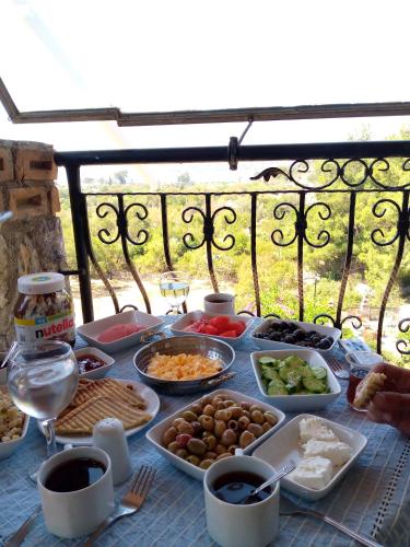 a table full of food on a table at Söğüt Butik Hotel in Marmaris