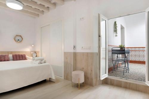 Posteľ alebo postele v izbe v ubytovaní Apartamento Cobarrubias