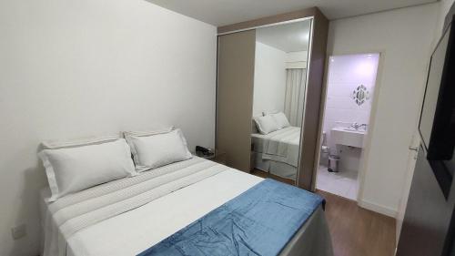 Cama o camas en una habitación de Tsue The Palace Moema limpieza diaria privada y balcón UH1303
