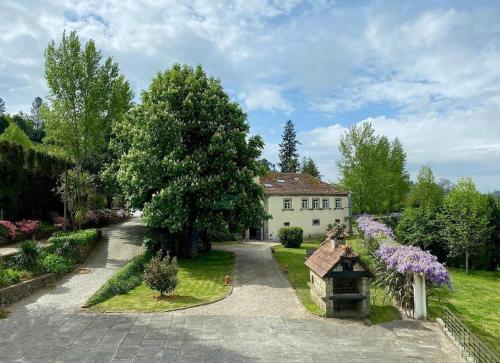 an aerial view of a house with a garden at Hotel de Charme Quinta do Pinheiro in Freamunde