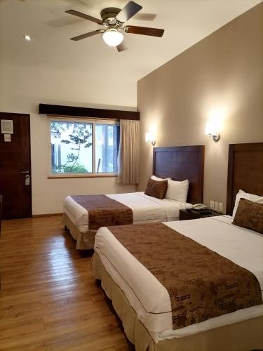 Katil atau katil-katil dalam bilik di Hotel Quinta Allende