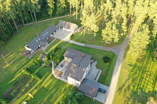 an aerial view of a house with a yard at Villa Männituka külalistemaja in Kirikuküla