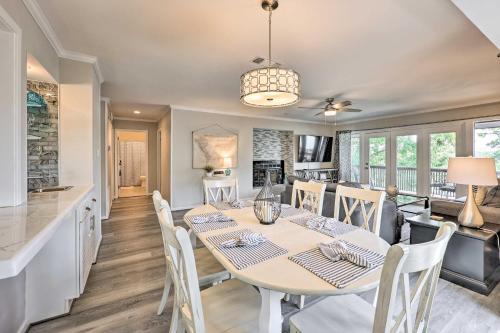 a kitchen and dining room with a table and chairs at Hot Tub Access Fantastic Condo in Hot Springs! in Hot Springs