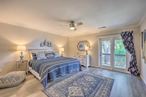 a bedroom with a bed and a window at Fantastic Hot Springs Condo Hot Tub Access! in Hot Springs