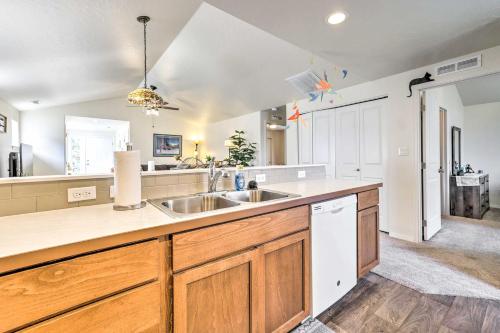 a kitchen with a sink and a counter top at Prismatic Boise Retreat with Fenced Backyard! in Boise
