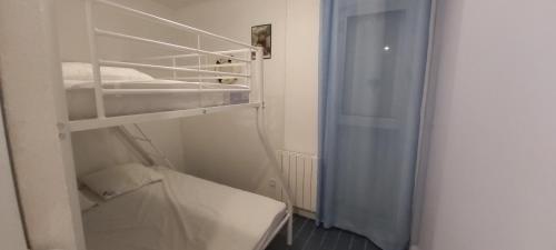 Posteľ alebo postele v izbe v ubytovaní Super T2 joli balcon centre port du Cap d'Agde