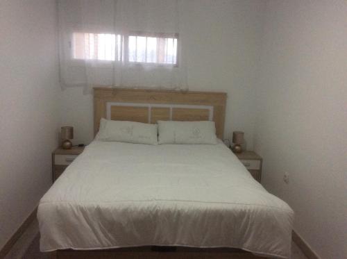 Postel nebo postele na pokoji v ubytování Precioso duplex con piscina y parking