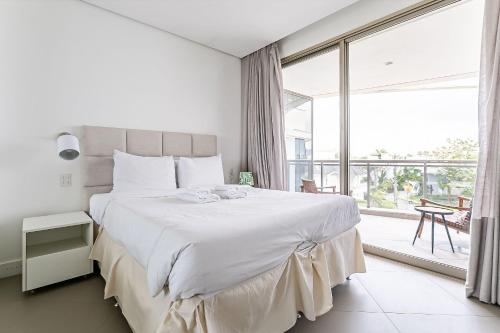 Кровать или кровати в номере WI-FI 200MB | 350m da Praia de Jurerê #JA07