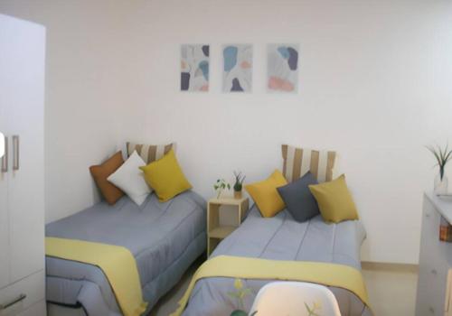 Katil atau katil-katil dalam bilik di Monoambiente en Caballito para 2 personas