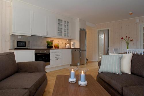 Η κουζίνα ή μικρή κουζίνα στο Nermo Hotel & Apartments