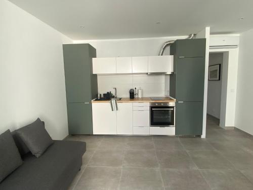 Kuchyň nebo kuchyňský kout v ubytování Apartamento T1 Cabanas de Tavira - Cantinho do Haduindo