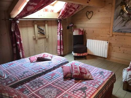 Zimmer mit 2 Betten in einer Hütte in der Unterkunft Gîte Gérardmer, 5 pièces, 9 personnes - FR-1-589-80 in Gérardmer