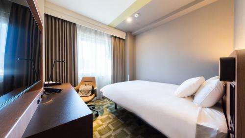 TV a/nebo společenská místnost v ubytování JR-East Hotel Mets Akabane