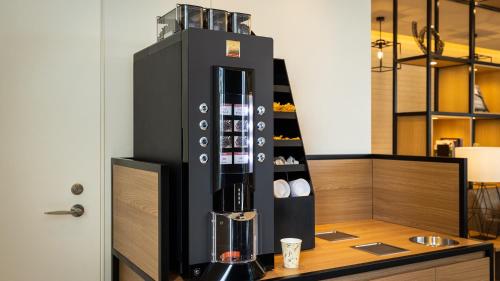 a coffee maker on a counter in a room at JR East Hotel Mets Premier Yokohama Sakuragicho in Yokohama
