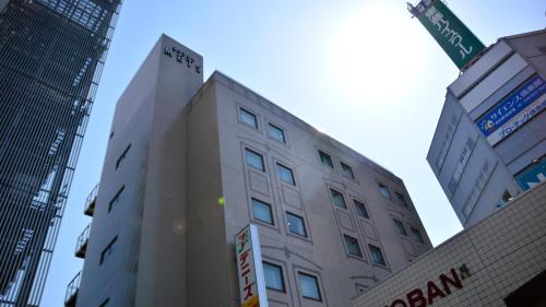 a tall building in a city with tall buildings at JR-East Hotel Mets Urawa in Saitama