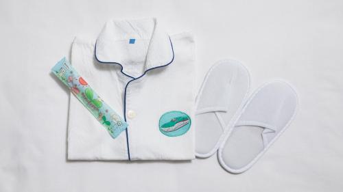 a white shirt with a stethoscope and a pair of scissors at JR-East Hotel Mets Mito in Mito