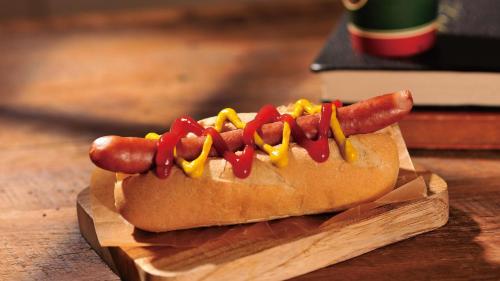 a hot dog on a bun with mustard and ketchup at JR-East Hotel Mets Mito in Mito