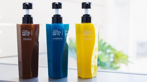 three bottles of hair products sitting on a counter at JR-East Hotel Mets Komagome in Tokyo