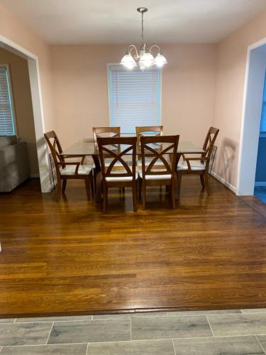 a dining room with a table and chairs at Beautiful Home Near Braves stadium&Atl united Fc in Marietta